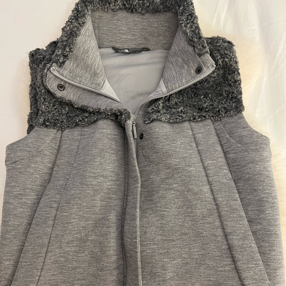 Light grey size small northface sweater vest with grey wooly neck/ collar